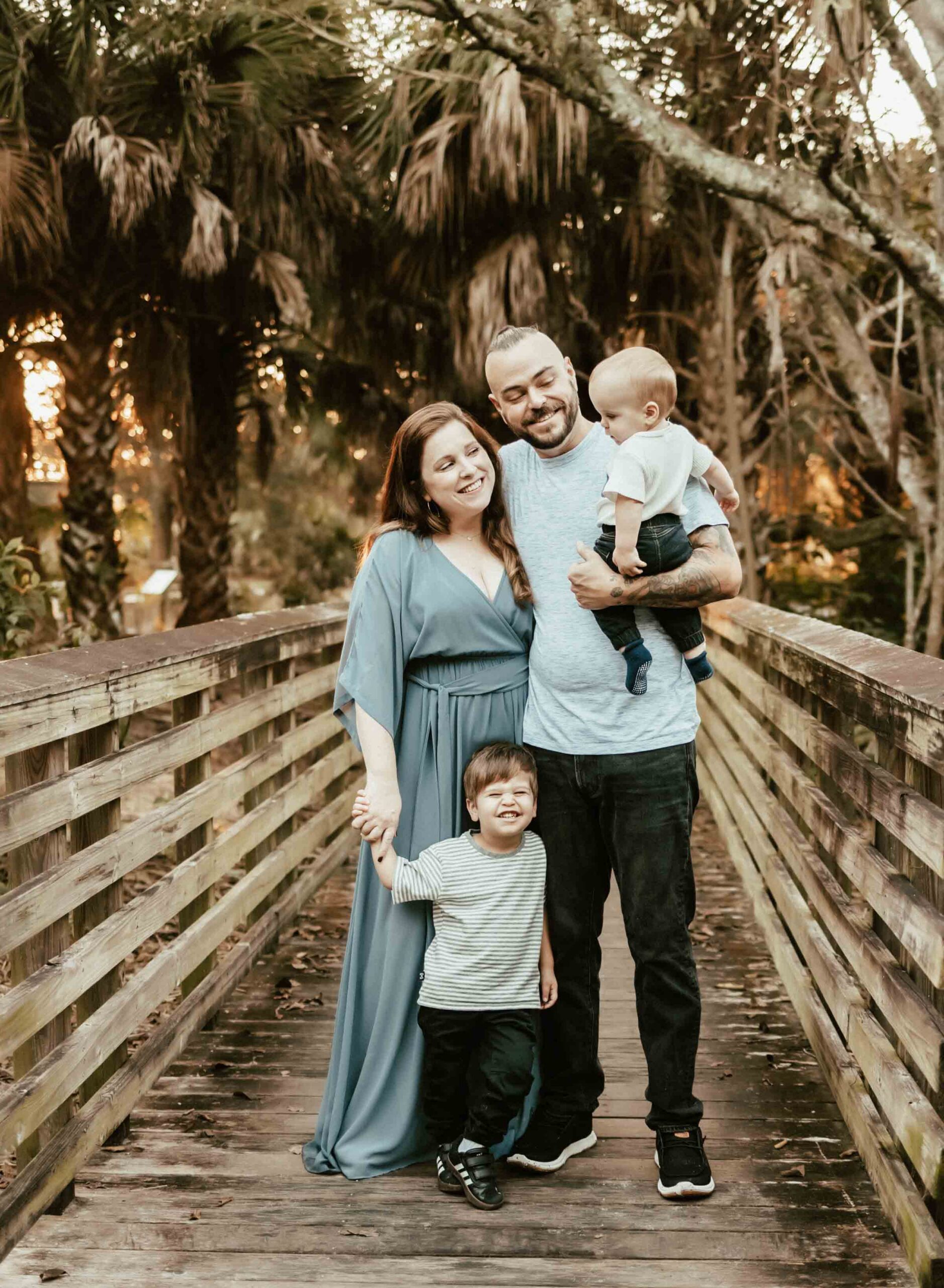 Boca Raton family at their sunrise photoshoot. Mom, dad and two little boys