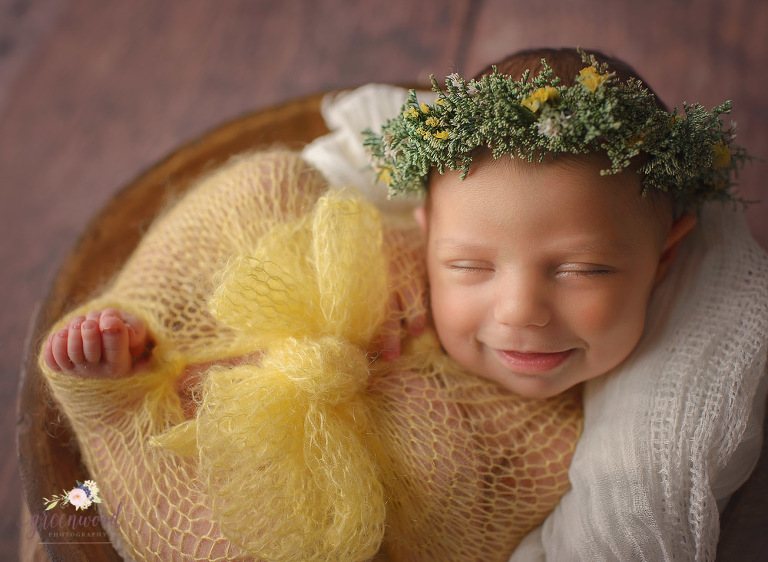 South Florida Newborn Photograher smiling baby girl yellow mohair wrap floral halo