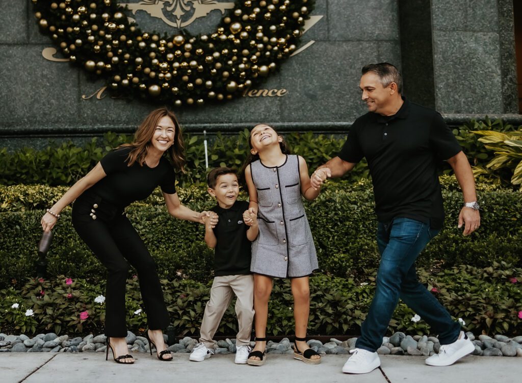 Family of 4 having fun Outdoors in Fort Lauderdale