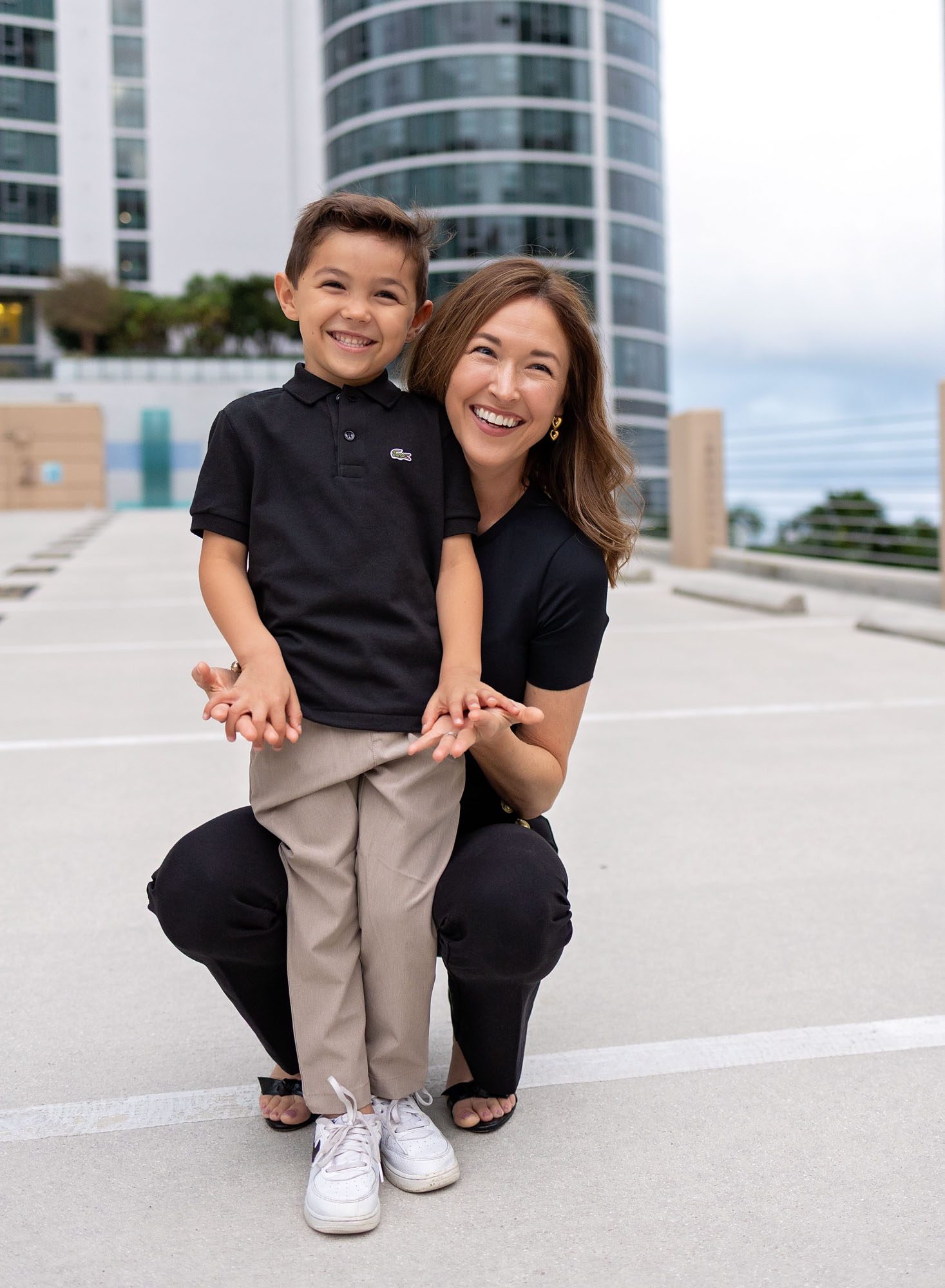 Mom and her little boy on a rooftop in Fort Lauderdale for their family photos.